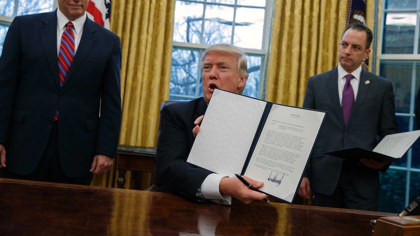 Donald Trump signs withdrawal from TPP