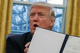 Donald Trump signs withdrawal from TPP