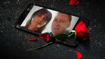 A broken phone, displaying a photo of a man and woman, and a rose.