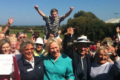 Locals celebrate planning back flip