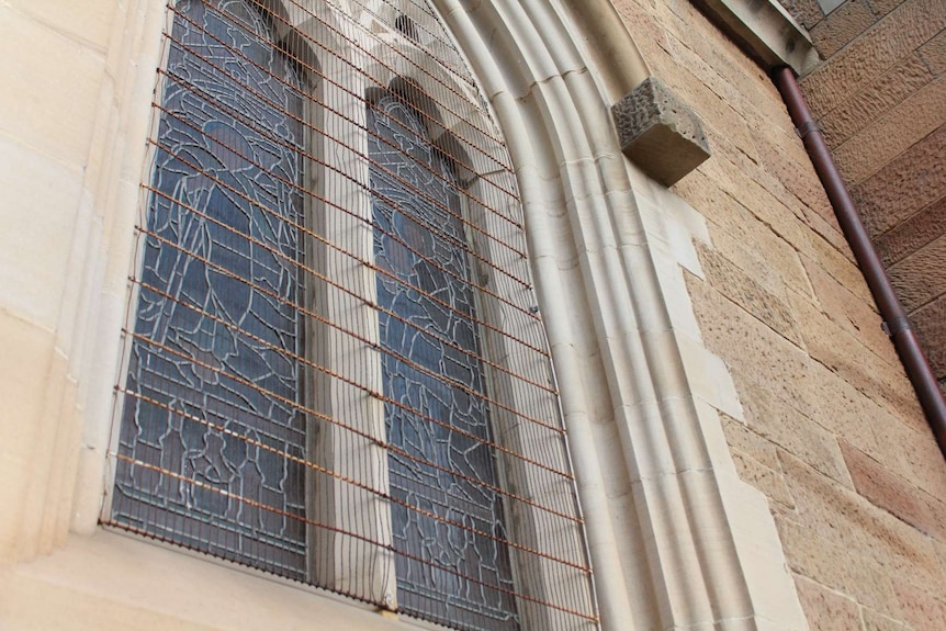 Wire over the windows of St Mary's Cathedral protecting the stained glass windows