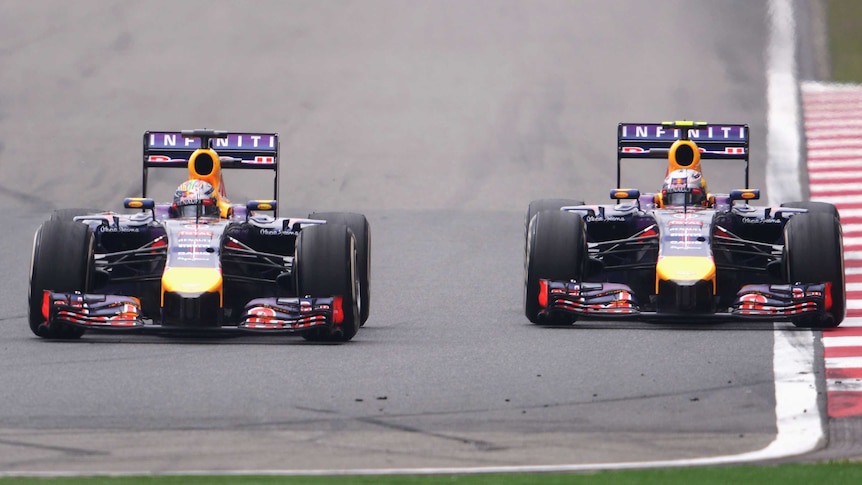 Sebastien Vettel and Daniel Ricciardo race at Chinese Grand Prix