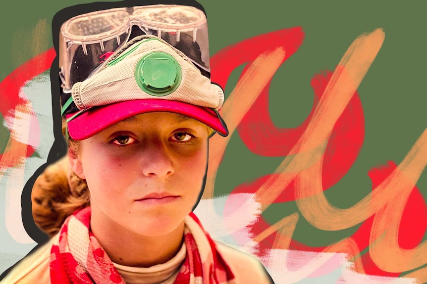 Girl pictured with goggles on her head in story about children and bushfire preparation and recovery