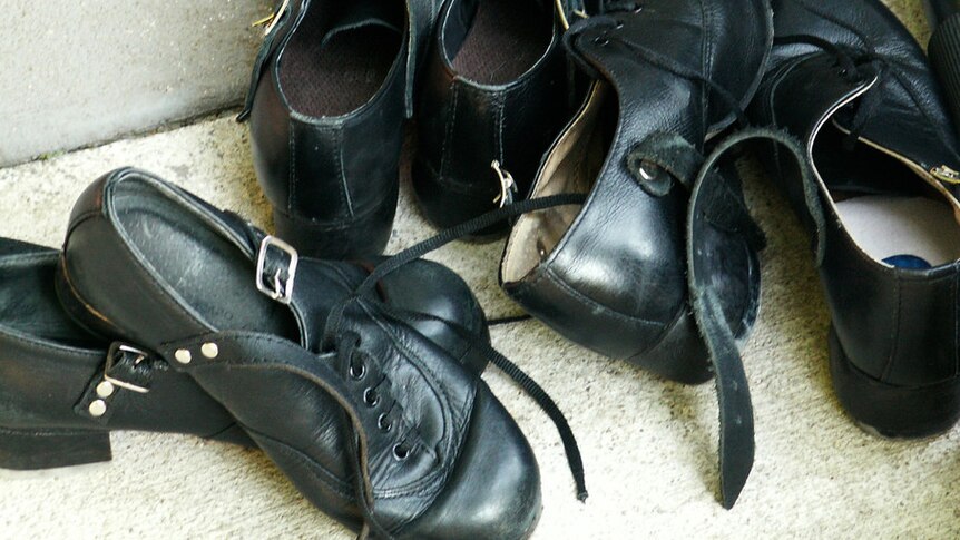 Dancing shoes with laces and buckles.