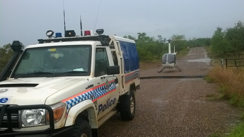 Helicopter on bush road in NT.