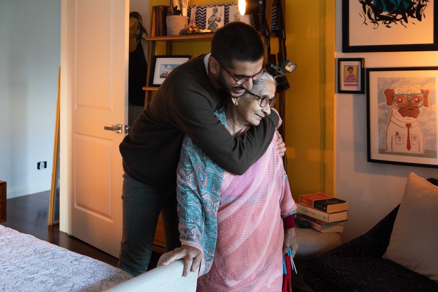 Sidd embraces his grandmother Sumitra for feature on young Australians' life during and after coronavirus isolation