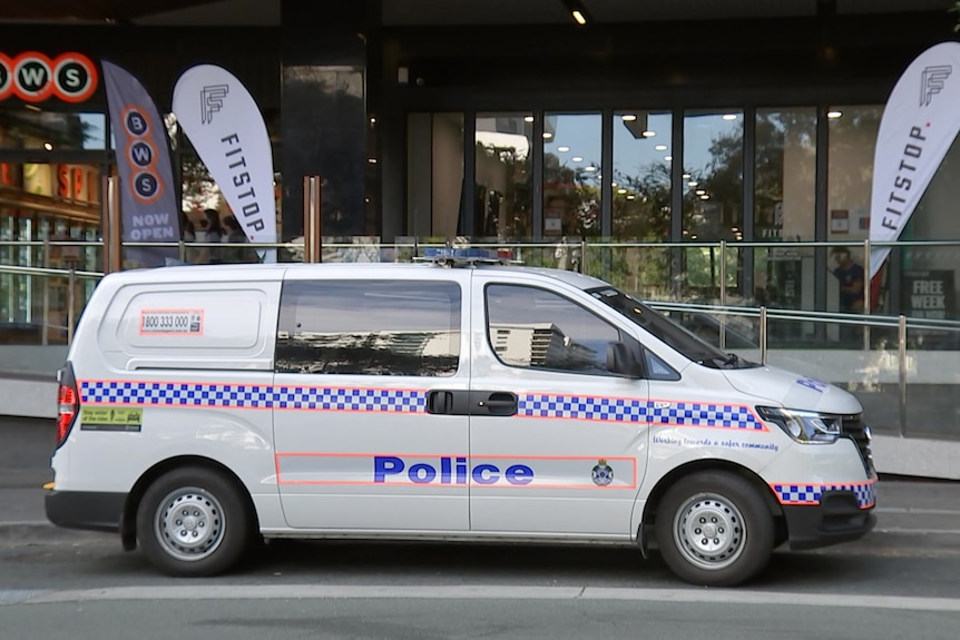 A police van parked on the street in the Brisbane suburn of Milton.