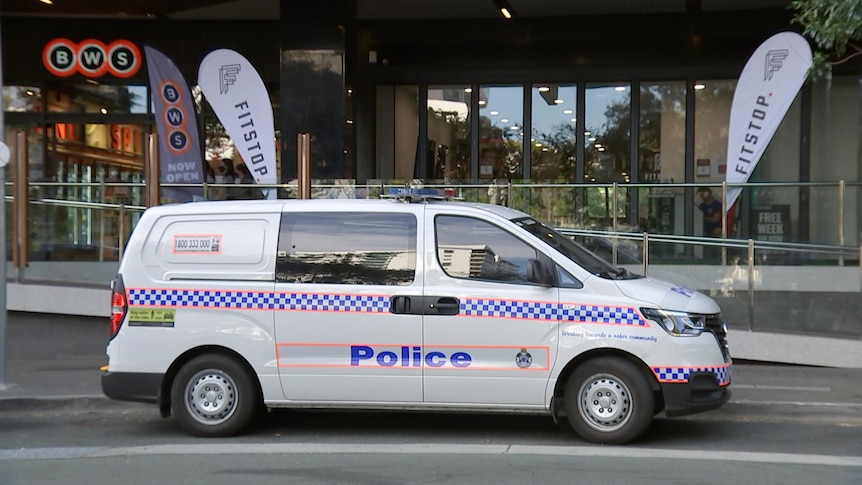 A police van parked on the street in the Brisbane suburn of Milton.