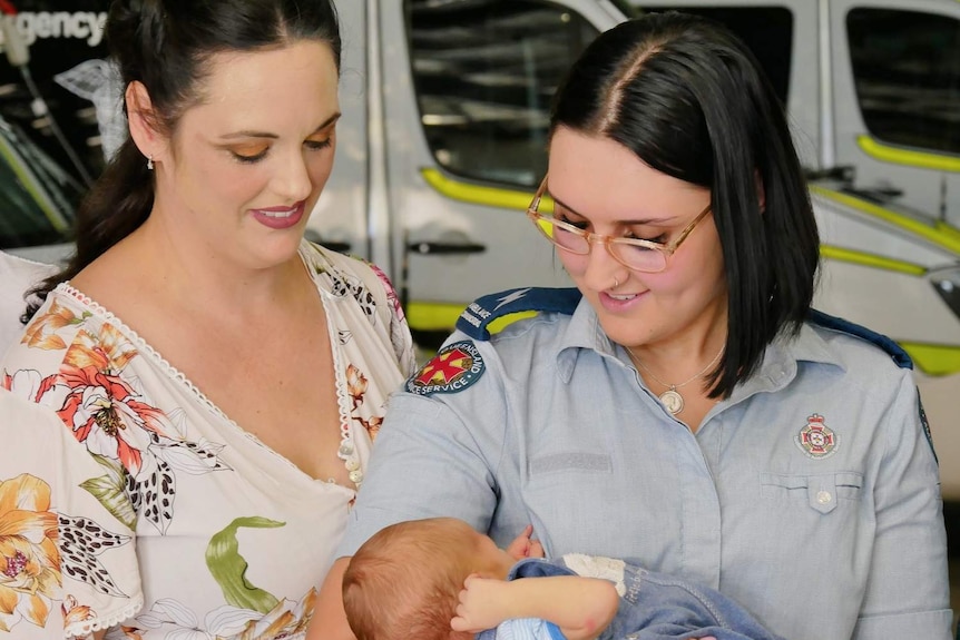 Emergency Medical Dispatcher Elaina and mum Alyssa-Marie with baby Carlo.