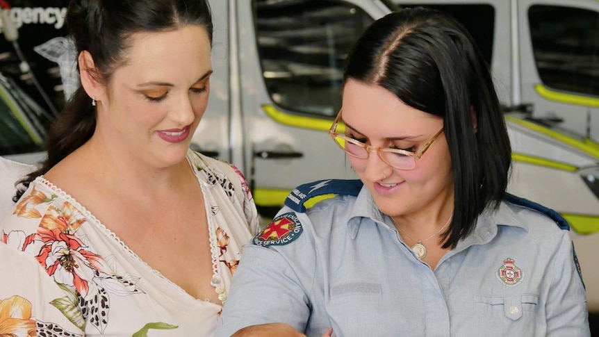 Emergency Medical Dispatcher Elaina and mum Alyssa-Marie with baby Carlo.