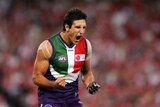 Matthew Pavlich clenches his fist in celebration (action pic)