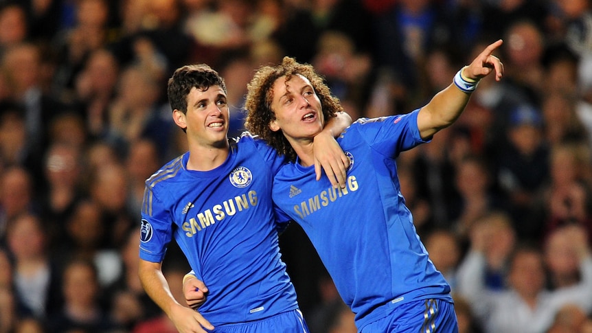 Oscar celebrates with Luiz