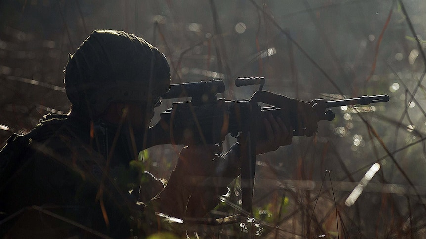 An Australian Army soldier from Delta Company enagages with an enemy target during a training exercise