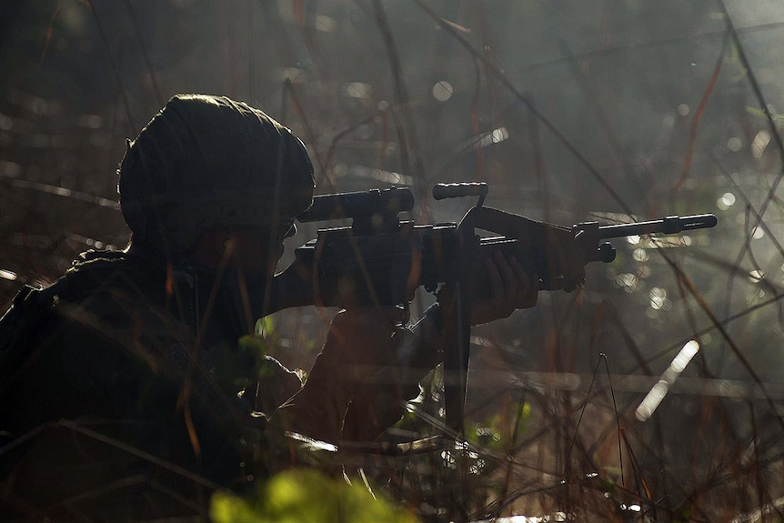 An Australian Army soldier from Delta Company enagages with an enemy target during a training exercise