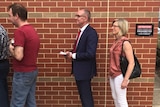Jay Weatherill and his wife lined up to vote.