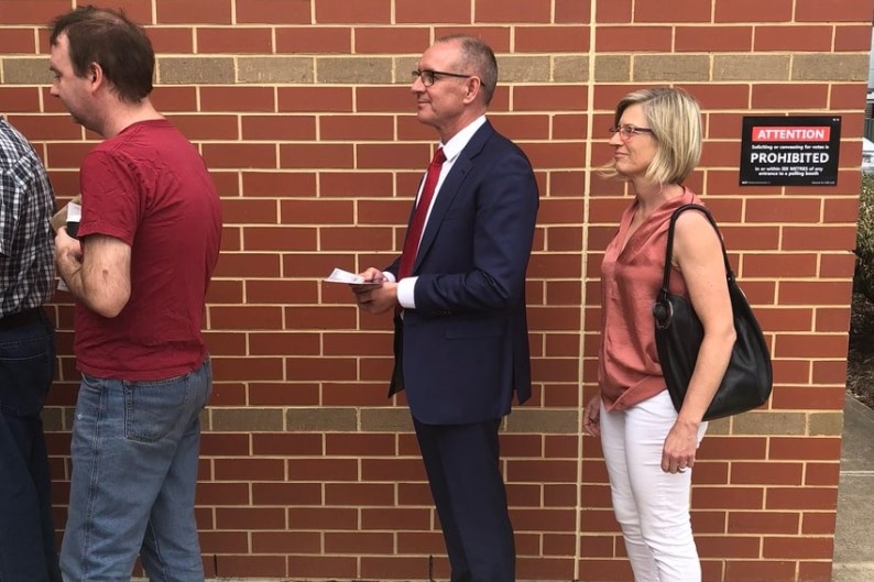 Jay Weatherill and his wife lined up to vote.