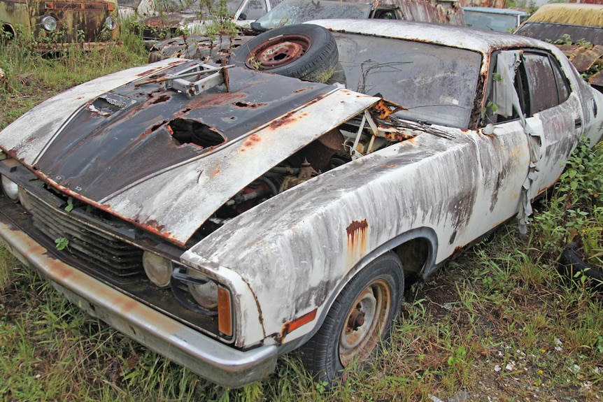 A rusted Ford at Gold Coast Auto Wreckers
