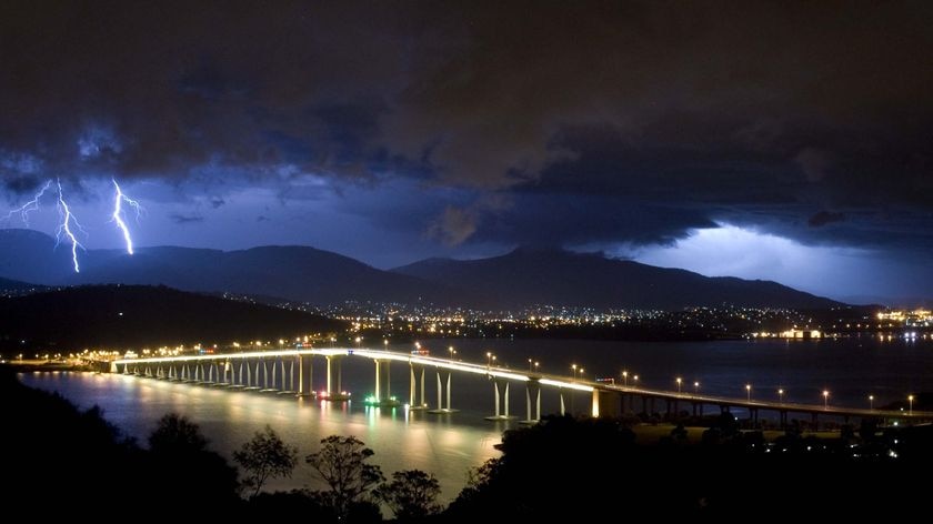 Lightning strikes on a hillside in Hobart
