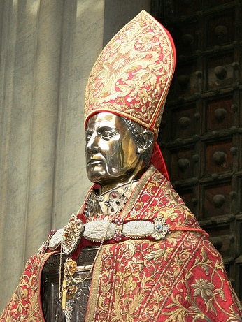 A silver bust of San Gennaro, or St Januarius, dressed in cope and mitre of silk and gold.