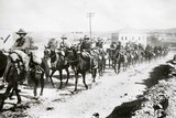 An Australian Light Horse regiment passes through Jerusalem mounted on horseback.