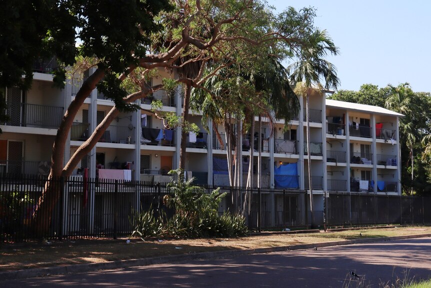 The exterior of a large public housing block in Darwin's suburbs.