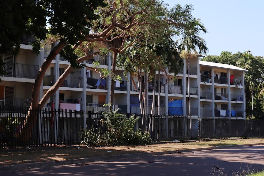 The exterior of a large public housing block in Darwin's suburbs.