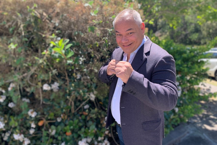 mayor tom tate in boxing stance 