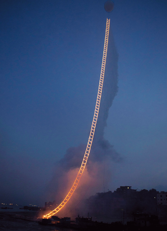 Night sky showing a burning 'ladder' from ground to sky, with balloon attached to top so that it floats.