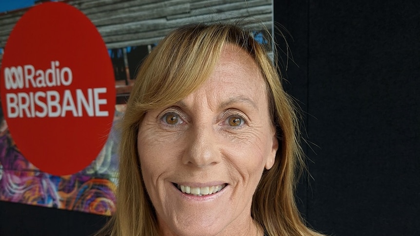 Julie Brims standing in the ABC Brisbane Studios