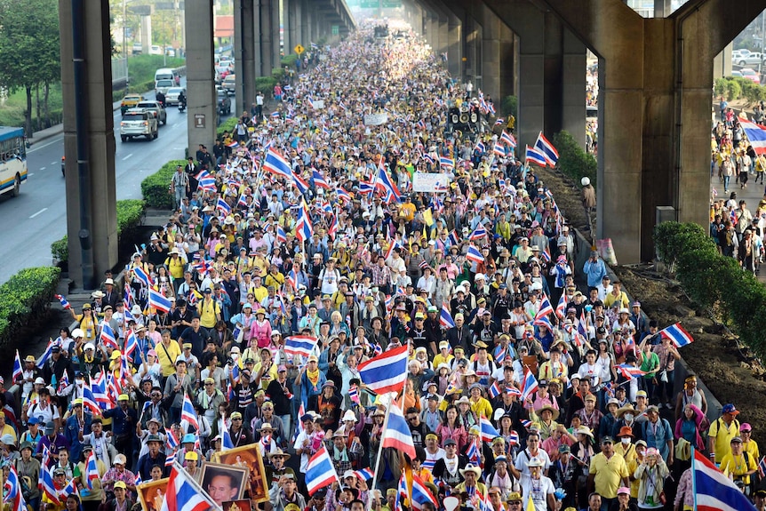 Protesters march in Bangkok