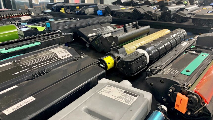An assortment of printer toner cartridges on display at the Close the Loop factory.