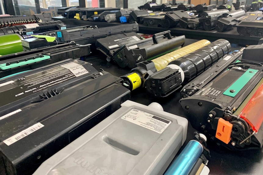 An assortment of printer toner cartridges on display at the Close the Loop factory.