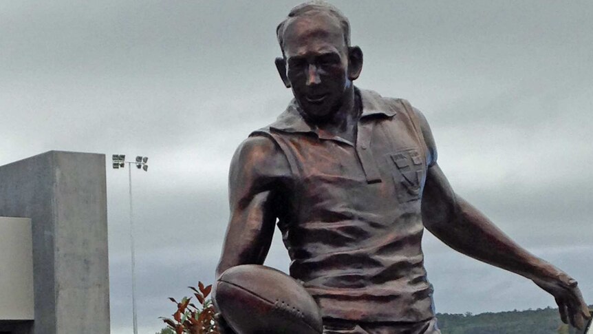 Bronze statue of football legend Darrel Baldock at Latrobe, Tasmania.