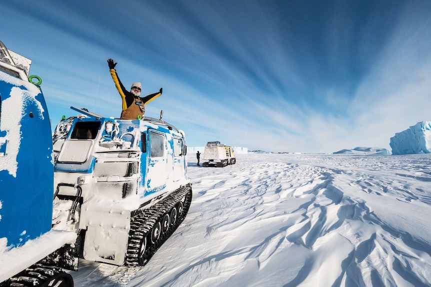 Antarctic expeditioner in a Hagglunds snow vehicle.