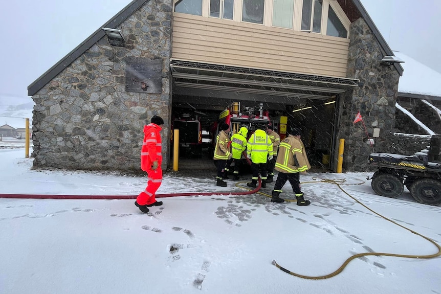 A snow lodge with firefighters inside.