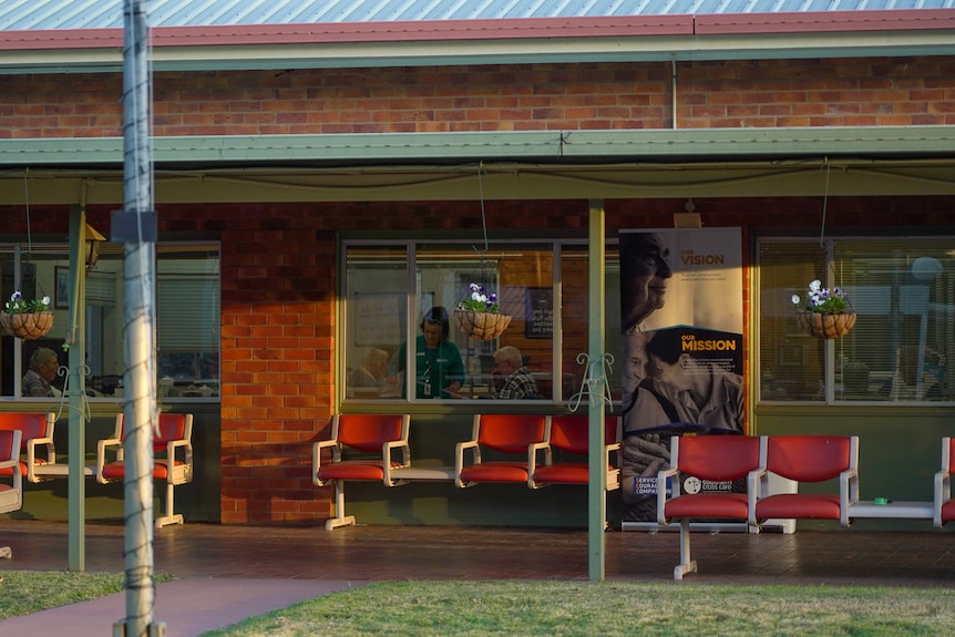 An external view looking through the window of an aged care home. 