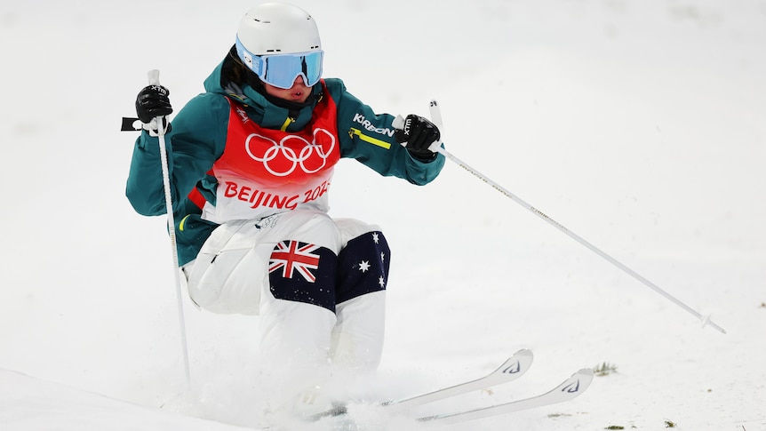 A woman competes in the freestyle skiing at the 2022 Winter Olympics 