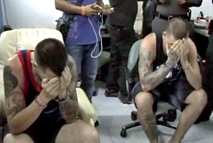 The men were arrested after two German tourists were shot in Phuket.
