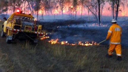 Firefighter at Woodstock blaze near Townsville on October 10, 2011.