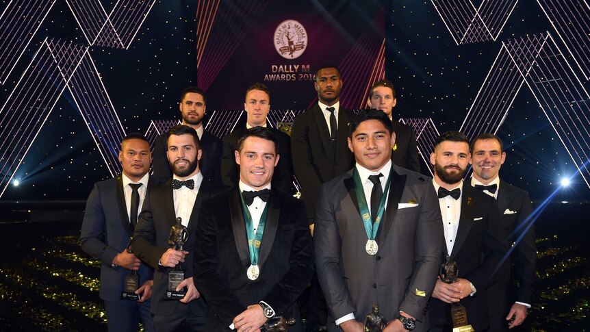 Members of 2016 NRL Team of the Year pose at Dally M Awards