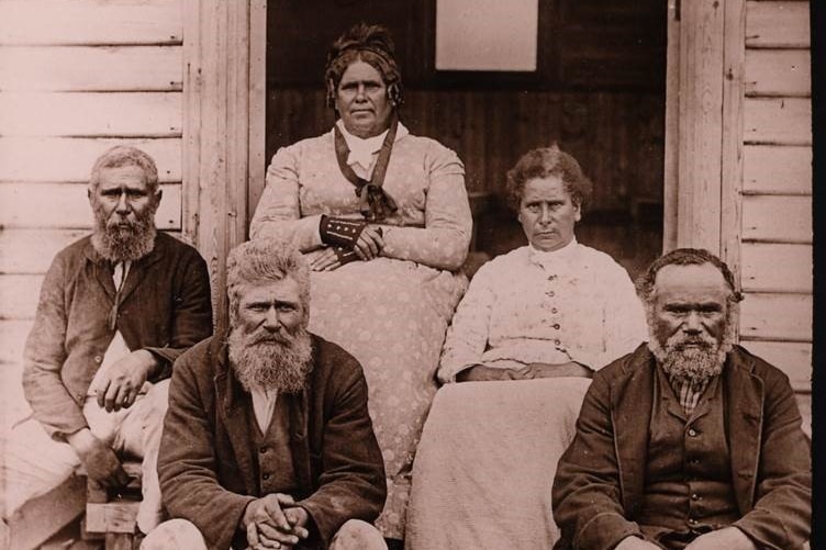 A black and white image of a group of elderly people, the children of sealers and Aboriginal mothers