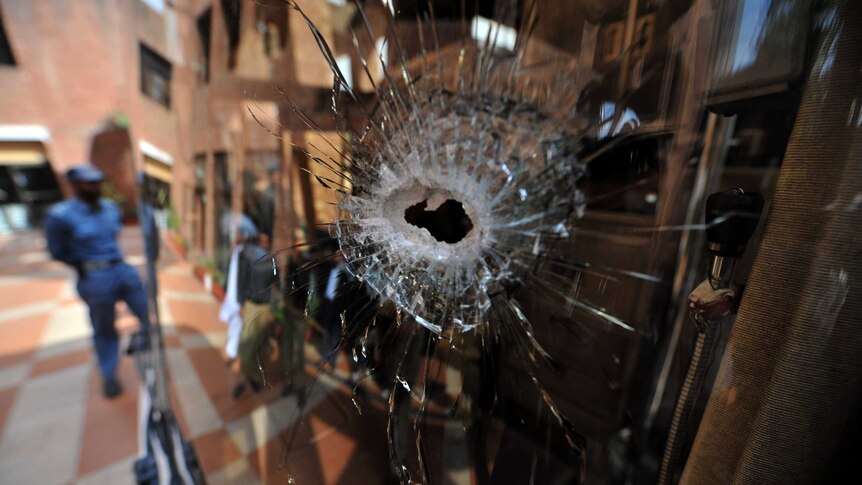 A bullet hole in Sri Lanka team's bus in Pakistan