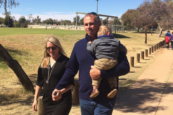 Adam Giles, with partner Phoebe and son Robert, says he will "have a beer" if he loses the election.