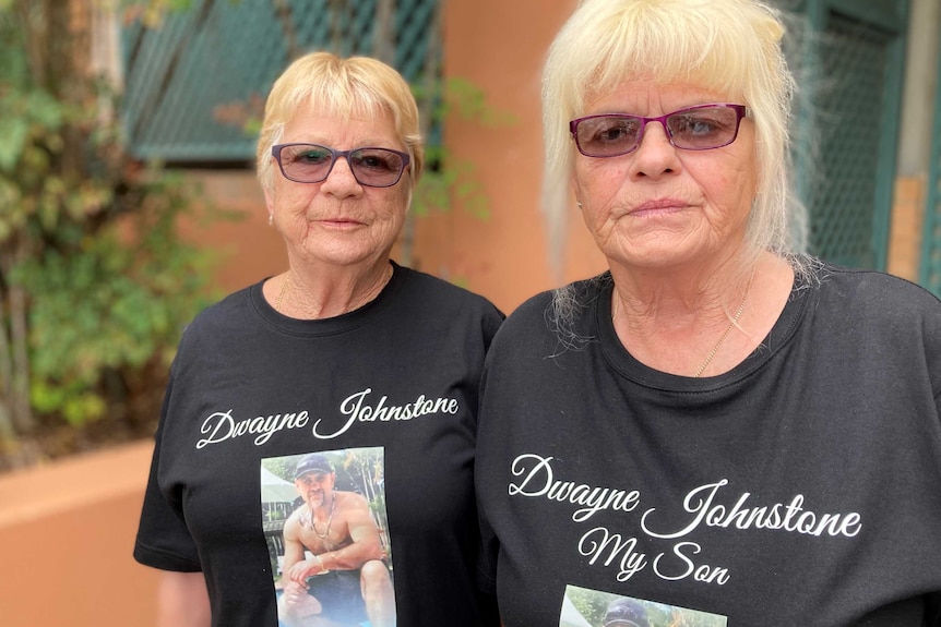 Kerry Crawford (right) with friend, Marilyn Butler, wearing t-shirts with Dwayne Johnstone's photo