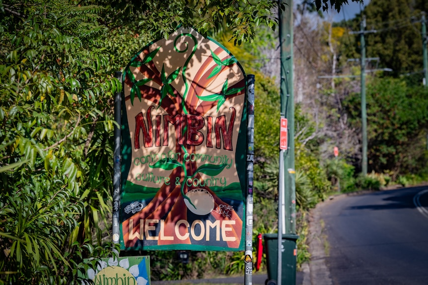 A colourful sign welcoming people to Nimbin