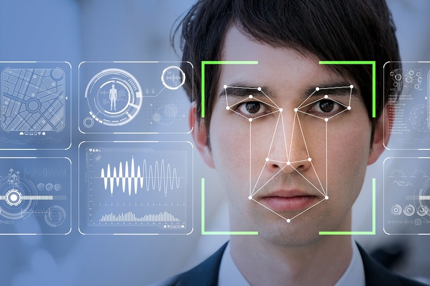 The man's face is scanned using facial recognition technology.