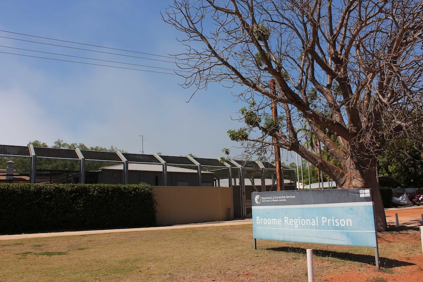 Broome Regional Prison exterior shot with sign in foreground.