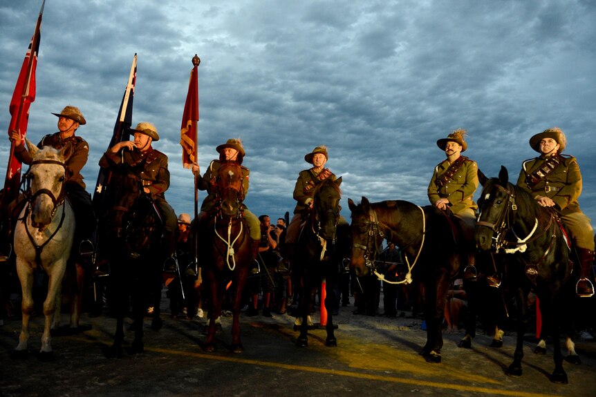 Members of the Light Horse brigade take part in the ANZAC Day dawn service at Currumbin.