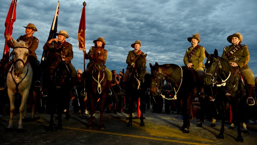 Members of the Light Horse brigade take part in the ANZAC Day dawn service at Currumbin.