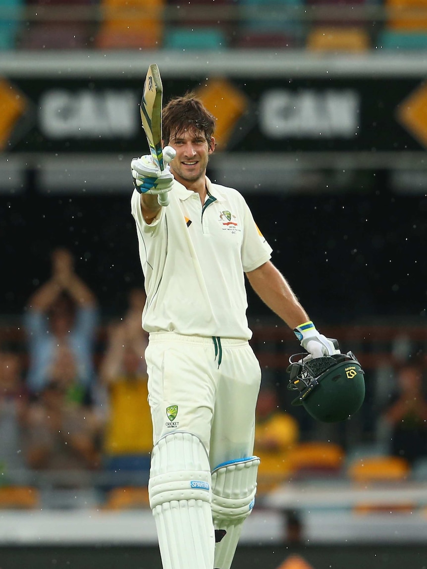 Australia's Joe Burns celebrates his maiden Test century against New Zealand at the Gabba.